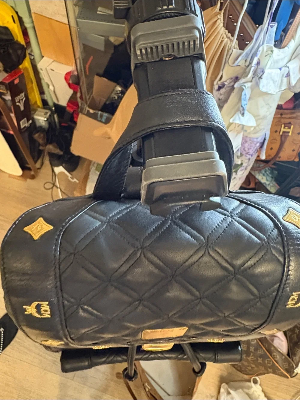 MCM Black Quilted Leather Backpack with Gold Accents